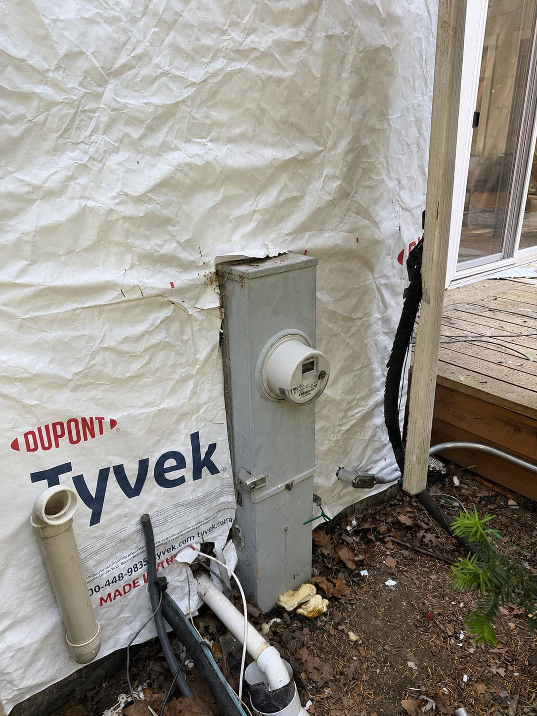 Cleaning Up Exterior Electrical Before New Siding Goes On image
